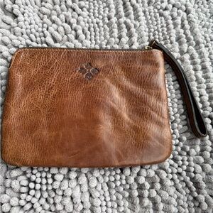 Patricia Nash boho distressed wristlet, lined with zipper and 2 slips inside
